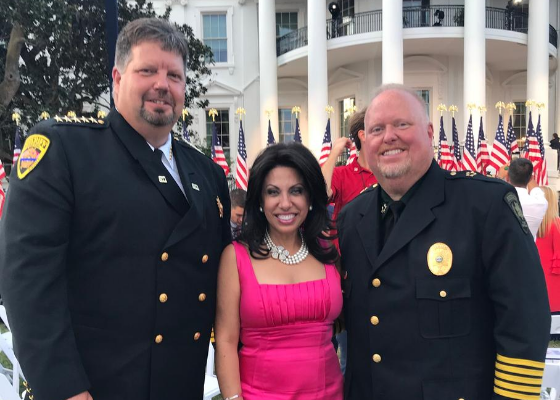 BRIGITTE WITH POLICE OFFICERS